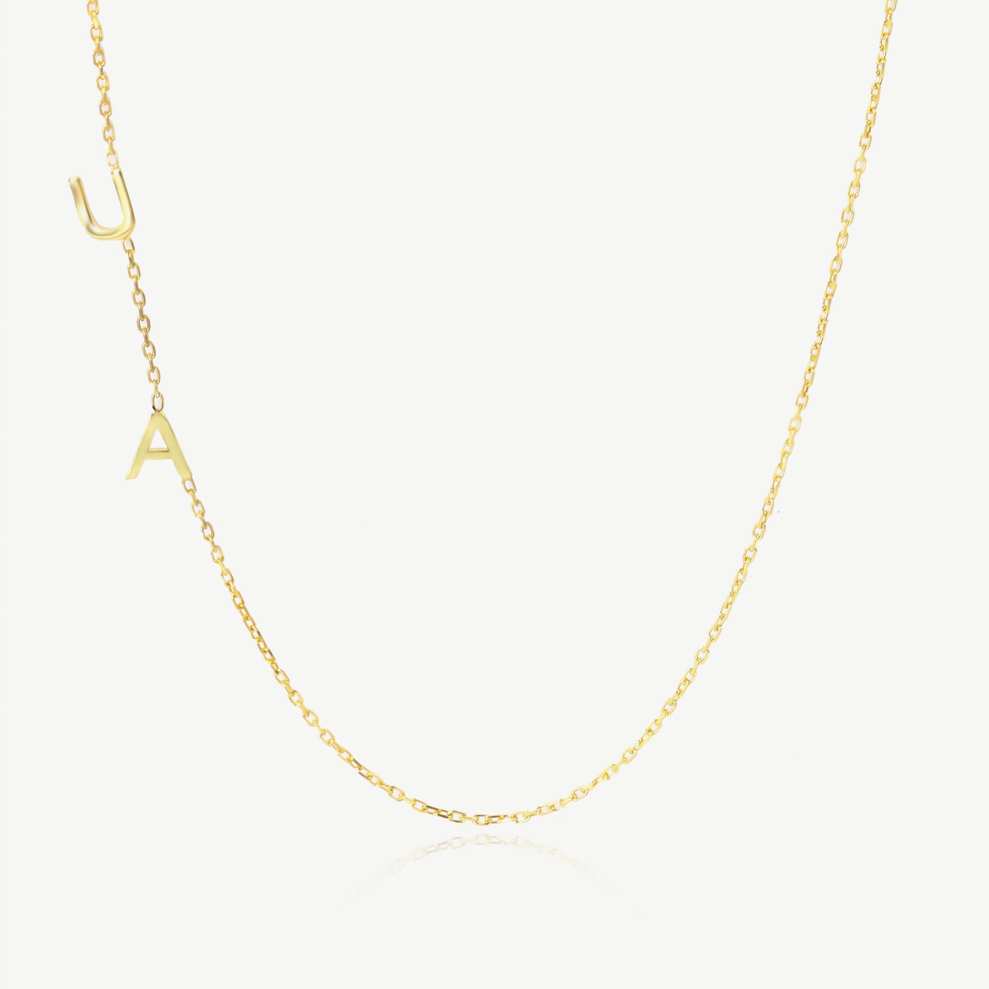 14K Yellow Gold UA letters necklace